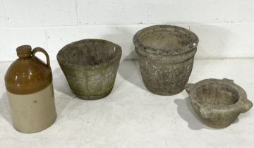 A collection of items including two garden planters, stoneware jar and small stone mortar