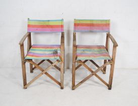 A pair of Next weathered folding directors style chairs