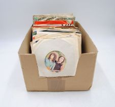 A quantity of 7" vinyl records, including T. Rex, The Rolling Stones, The Beatles, The Everly