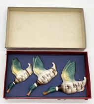 A set of three graduated flying mallards in original box