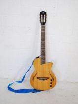 A Harley Benton CL Nashville-Nylon NT six string electric guitar, with strap, 1/4 jack lead and '
