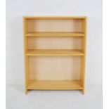 A modern freestanding bookcase - length 80cm, depth 28cm, height 107cm