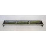 A weathered galvanised animal feeding trough - length 181cm, depth 29cm, height 14cm