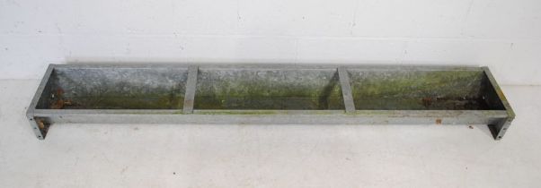 A weathered galvanised animal feeding trough - length 181cm, depth 29cm, height 14cm