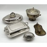 A collection of silver plated items including walnut shaped nutcracker etc.