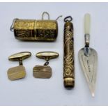 A hallmarked silver trowel shaped bookmark along with a propelling pencil, rolled gold cufflinks