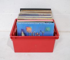 A quantity of various 12" vinyl records, including The Hitch Hikers Guide To The Galaxy, Rod