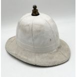 A vintage pith helmet - possibly Royal Marines