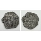 A 1693 Charles II 8 Reales coin from Bolivia, losses to edge as shown and rubbing to reverse