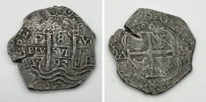 A 1693 Charles II 8 Reales coin from Bolivia, losses to edge as shown and rubbing to reverse