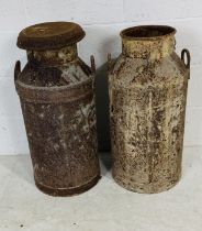 Two vintage weathered milk churns - one missing lid