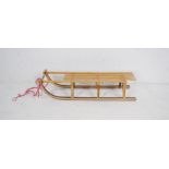 A child's vintage wooden sledge, A/F