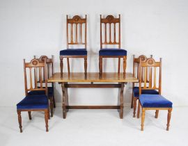 An oak refectory table along with a set of six oak Arts and Crafts dining chairs - length 152cm,