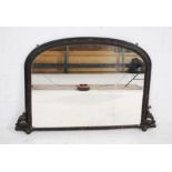 A Victorian over-mantle mirror with carved decoration - length 127cm, height 84cm