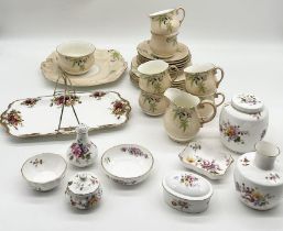 A Paragon tea set comprising of six trios, milk jug, sugar bowl and sandwich plate along with a