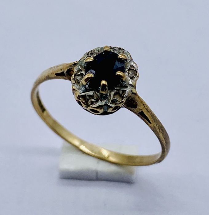 A 9ct gold sapphire cluster ring