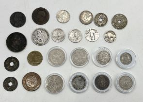 A collection of various coinage including some silver, florins, shillings, George IIII penny, US 1/2