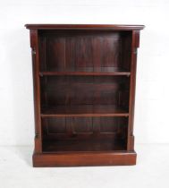 A Victorian style mahogany freestanding bookcase, with column detailing to sides - length 92cm,