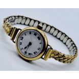 A 9ct gold wristwatch on expandable strap