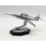 A 'Jet Plane' chrome table lighter on ball and socket stand and octagonal plinth