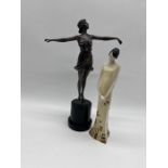 A resin Art Deco dancer (height 39cm) along with another figurine.