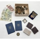 A collection of various coinage and bank notes including an 1892 Victorian Crown
