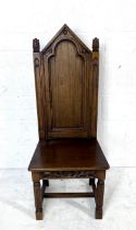 An oak gothic style hall chair.