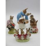 A collection of Beatrix Potter figures including a Beswick Ltd edition Mrs Rabbit and Peter along