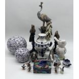 An assorted lot including an ornamental Peacock by Gisela Graham, various ceramics, bloodhound and