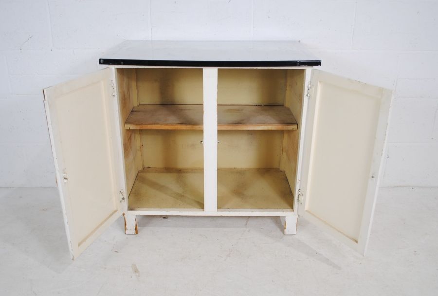 A vintage white painted two door cupboard with enamelled top (A/F) - length 77cm, depth 46cm, height - Image 4 of 6