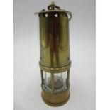 A miniature brass miners lamp, height (excluding hook) 13cm