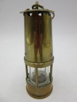 A miniature brass miners lamp, height (excluding hook) 13cm