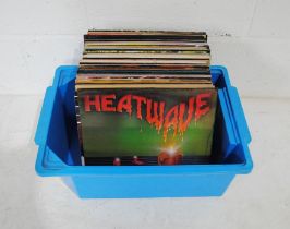 A collection of funk and soul 12" vinyl records, including Heatwave, The Temptations, Pointer