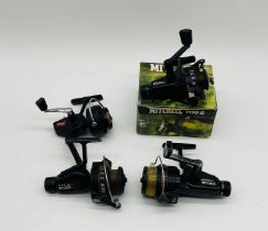 A collection of four Mitchell fixed fishing reels - one boxed