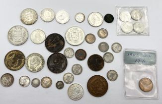 A collection of various coinage including a number of Victorian silver 3d's, 1 1/2 pence, francs