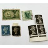 A small collection of stamps including a Penny Black and Penny Blue