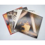 A collection of five Kate Bush vinyl records, comprising 'Lionheart', 'The Dreaming', 'Never for