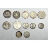A collection of silver coinage and medallions including a George V Jubilee silver medallion,