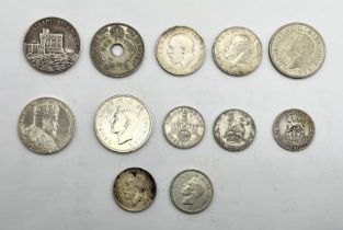 A collection of silver coinage and medallions including a George V Jubilee silver medallion,