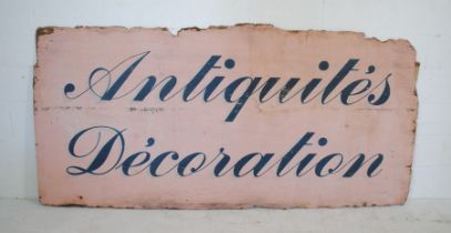 A large weathered French painted antique sign - "Antiquites Decoration" - 250cm x 122cm