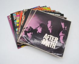 A collection of ten 12" vinyl records by The Rolling Stones, including 'After-math' (x2), 'Out Of