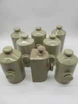 A collection of 8 Victorian stoneware hot water bottles