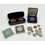 A small collection of coins and a pair of gold plated spectacles along with a QE2 Royal Wedding