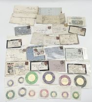 A collection of Victorian stamps on envelopes and loose, mainly penny reds, along with 19th