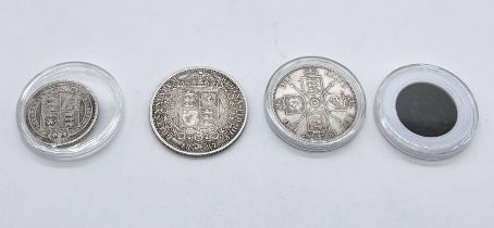 Four Victorian coins comprising of an 1887 half crown, 1887 florin, 1889 shilling and 1882 farthing