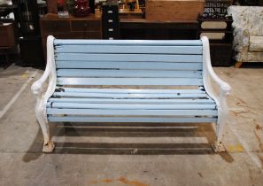 A 19th century cast iron garden bench, marked 'Benton & Certell... '(?) with lions head arms and