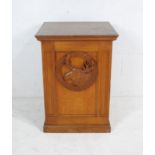 An oak altar from the Exmouth 'LOOM' (Loyal Order Of Moose) lodge with carved plaque to front -