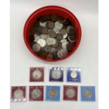 A collection of various coinage including commemorative crowns, £2, pennys etc.