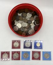 A collection of various coinage including commemorative crowns, £2, pennys etc.