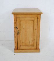 A pine washstand with lift up lid and cupboard under. 56cm x 54cm, height 84cm